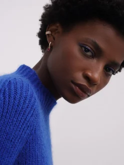 Camisola de meia gola em lã com punhos dobrados