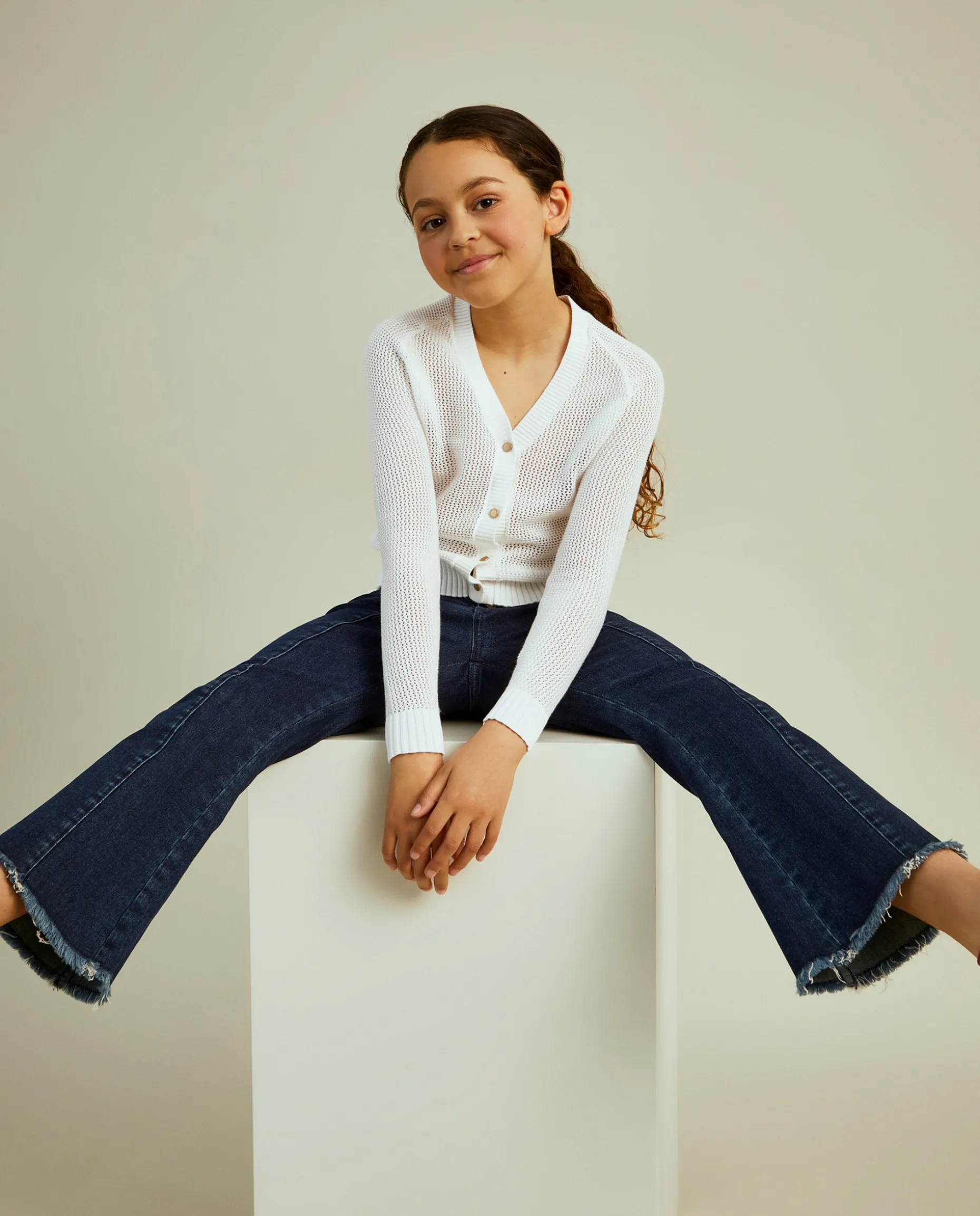 Casaco de malha com botões em contraste