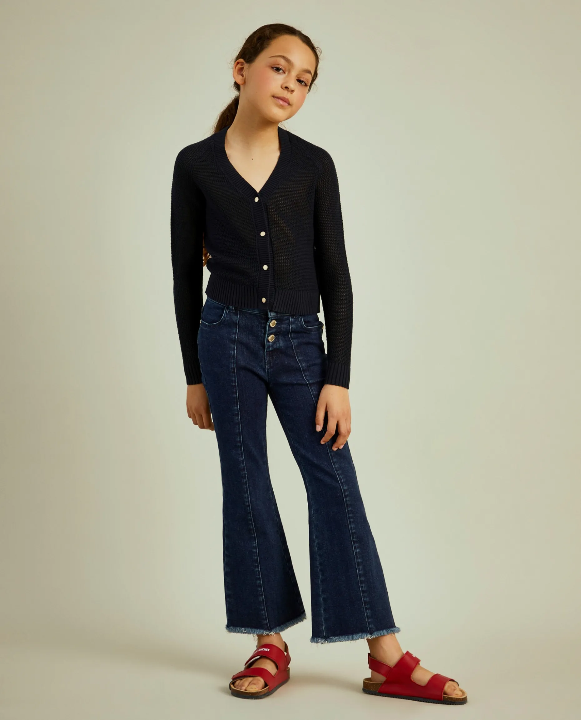 Casaco de malha com botões em contraste