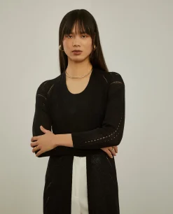 Casaco de malha com estrutura geométrica