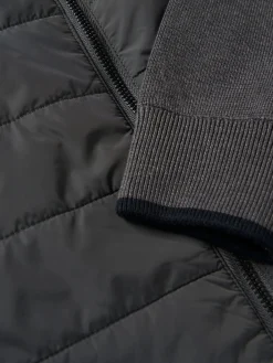 Casaco de malha com frente acolchoada