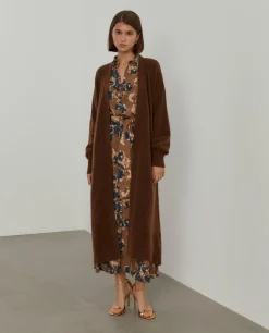 Casaco de malha comprido mangas abalonadas