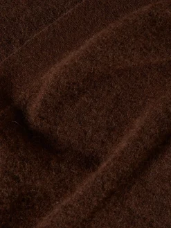 Casaco de malha comprido mangas abalonadas