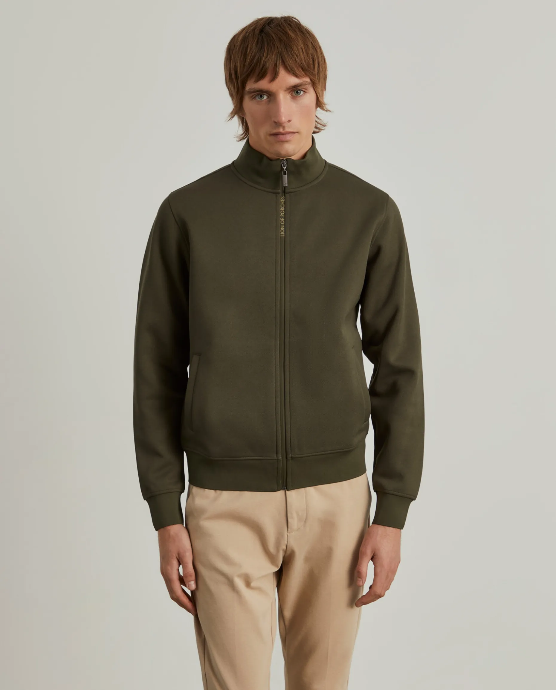 Casaco de malha texturizada com fecho