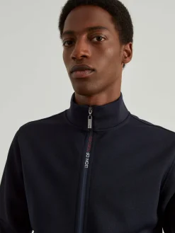 Casaco em malha texturizada com fecho