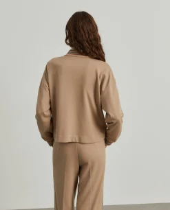 Casaco malha às riscas com bolsos