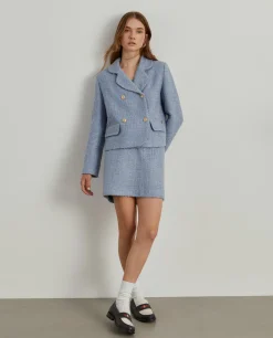 Casaco tweed cruzado com bolsos