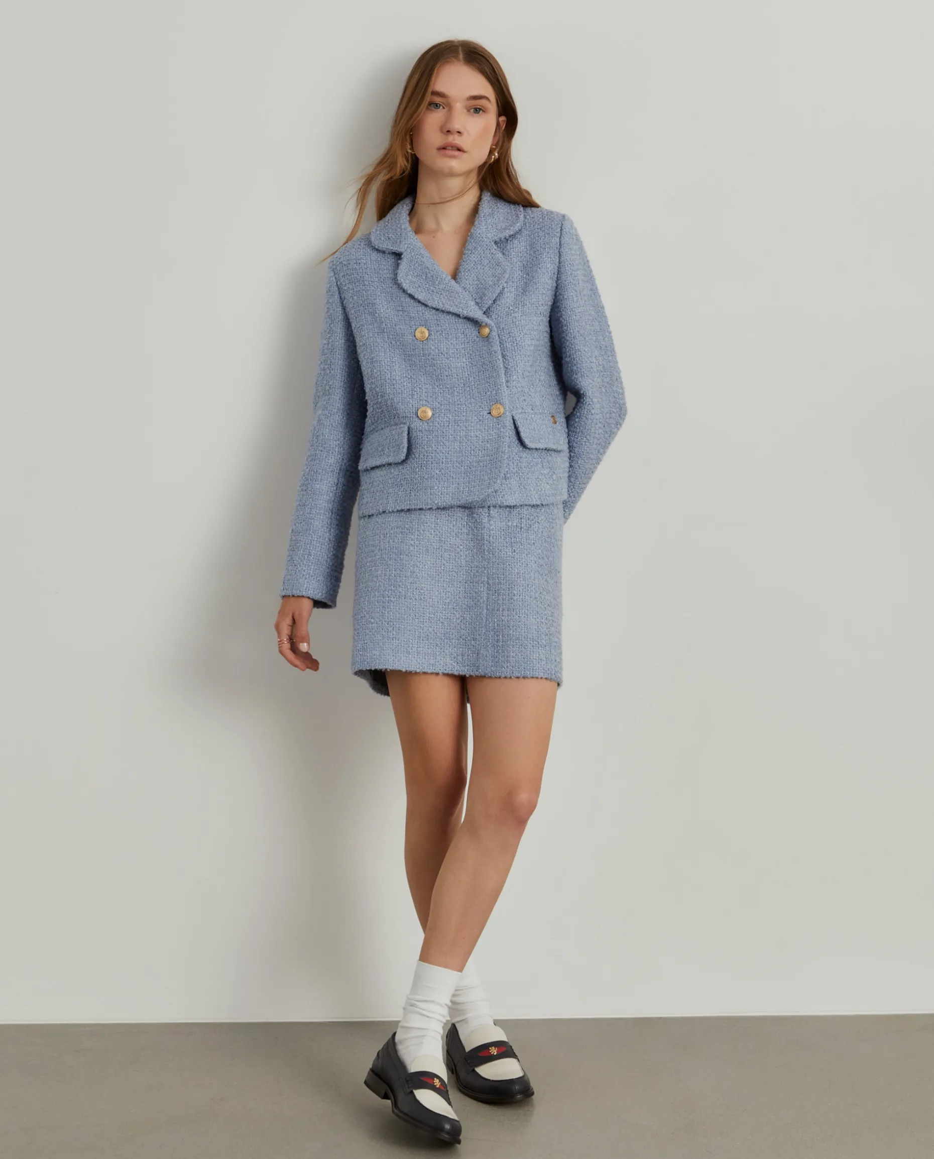 Casaco tweed cruzado com bolsos