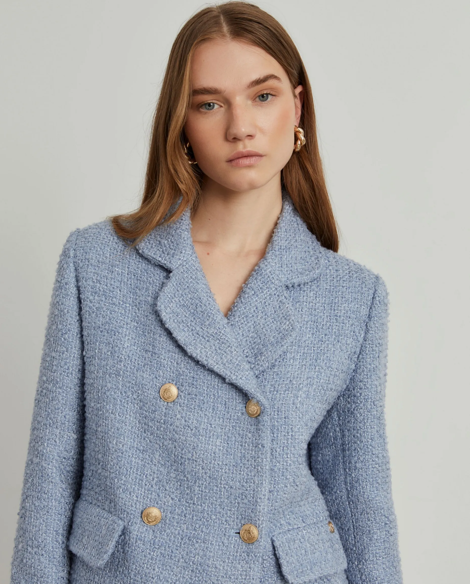 Casaco tweed cruzado com bolsos