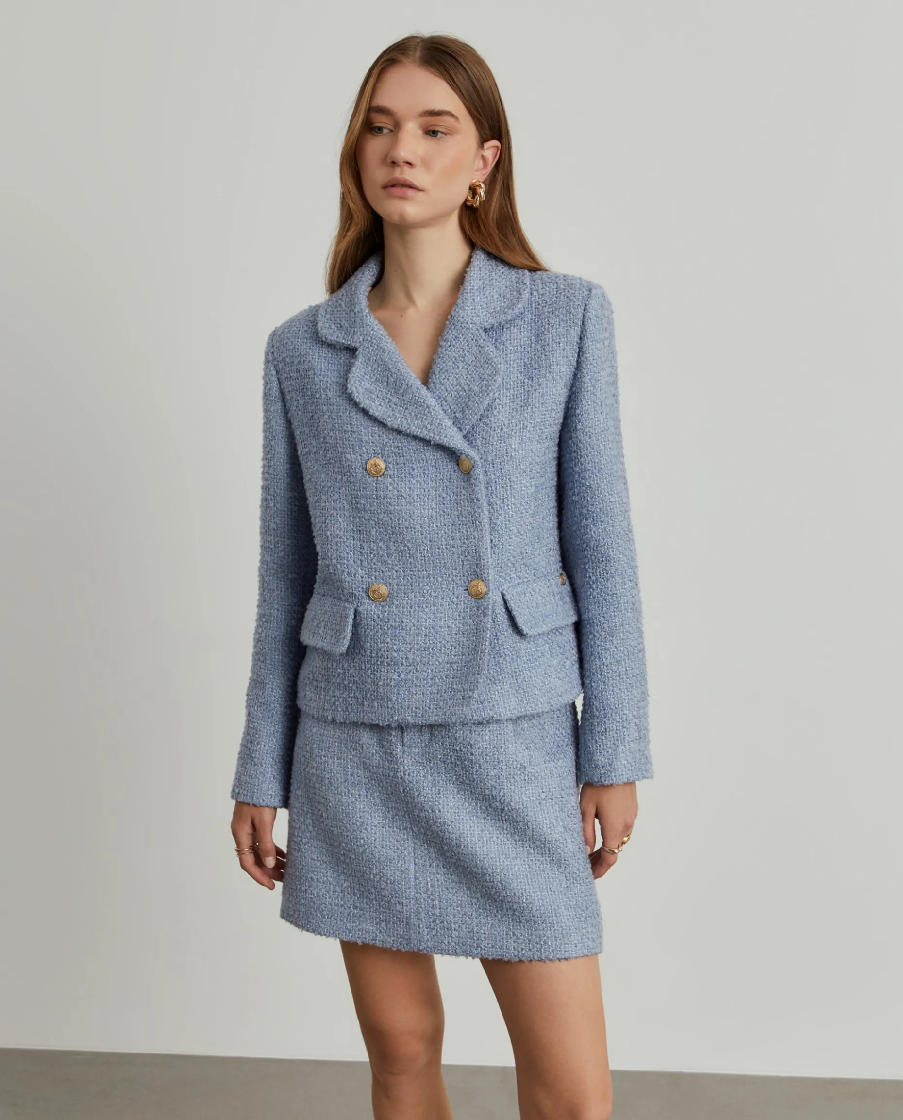 Casaco tweed cruzado com bolsos