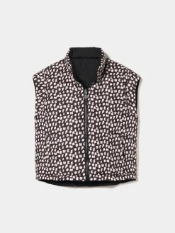 Colete reversível com fecho