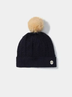 Gorro em malha tricotada com pompom