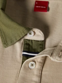 Polo bicolor de manga comprida