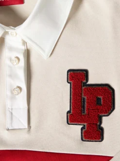 Polo manga comprida às riscas