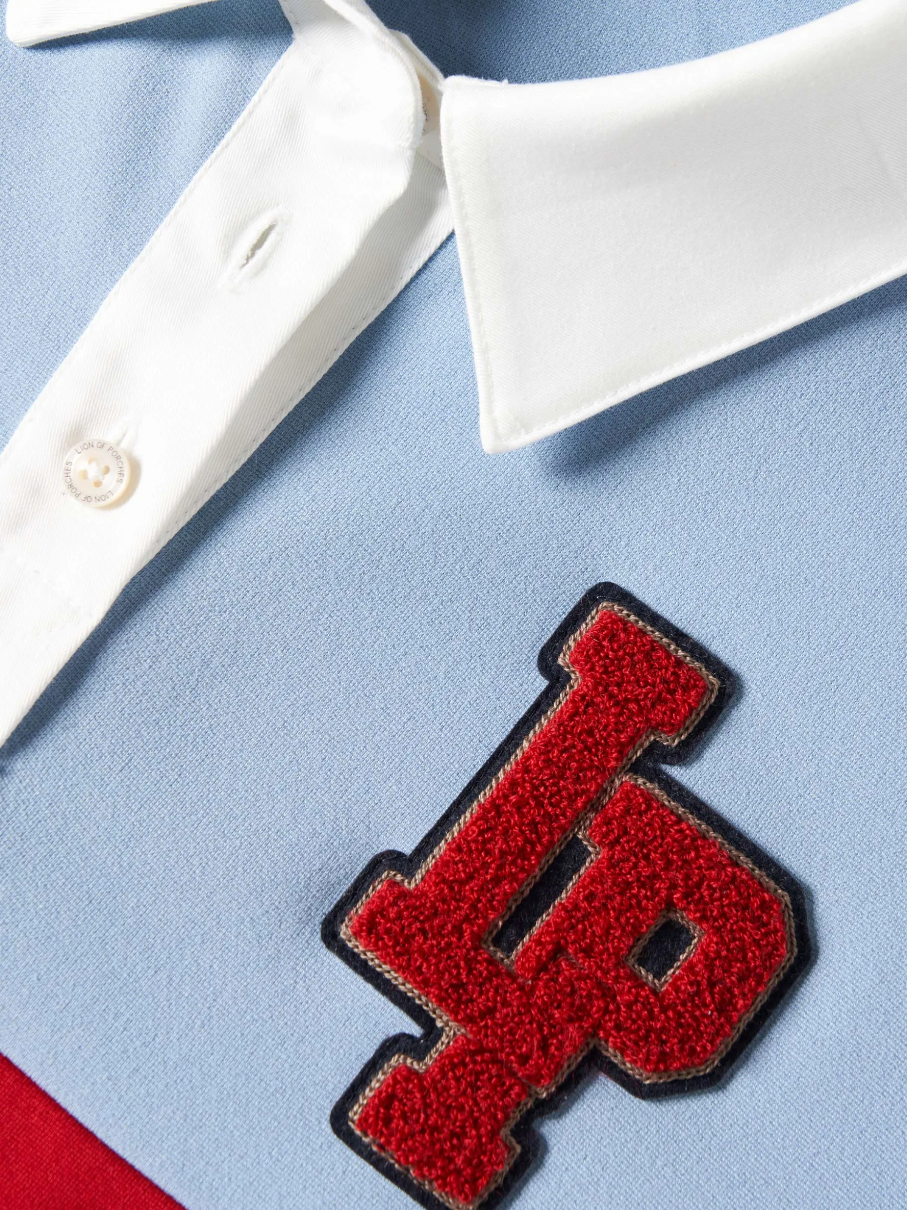 Polo manga comprida às riscas