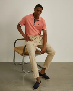 Polo manga curta em algodão com riscas