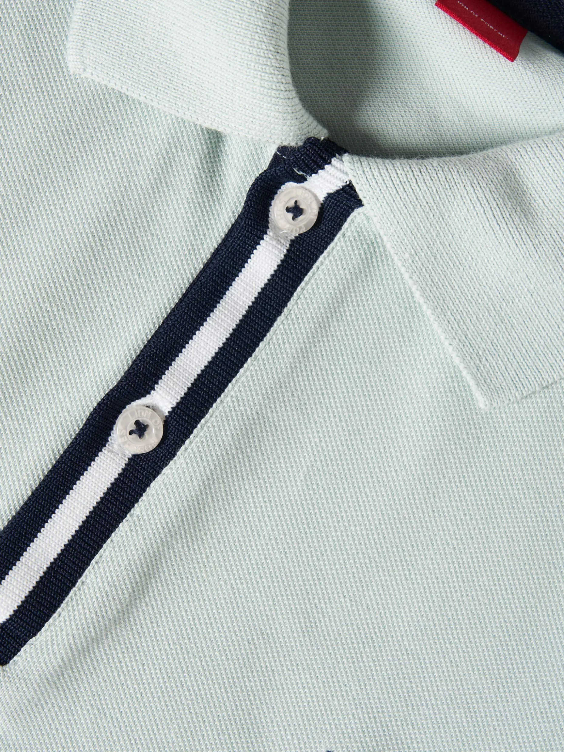 Polo manga curta em algodão com riscas