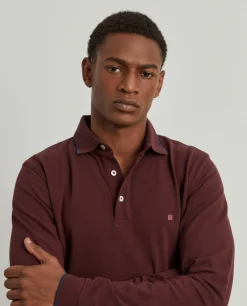 Polo piqué slim fit manga comprida