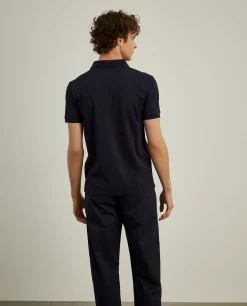 Polo slim fit com bolso em contraste