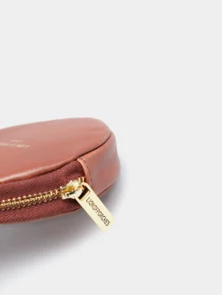 Porta-moedas circular 100% pele