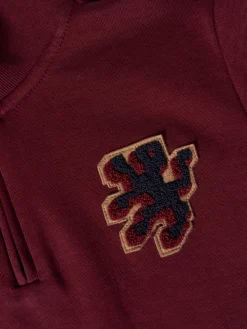 Sweater com fecho e riscas em contraste