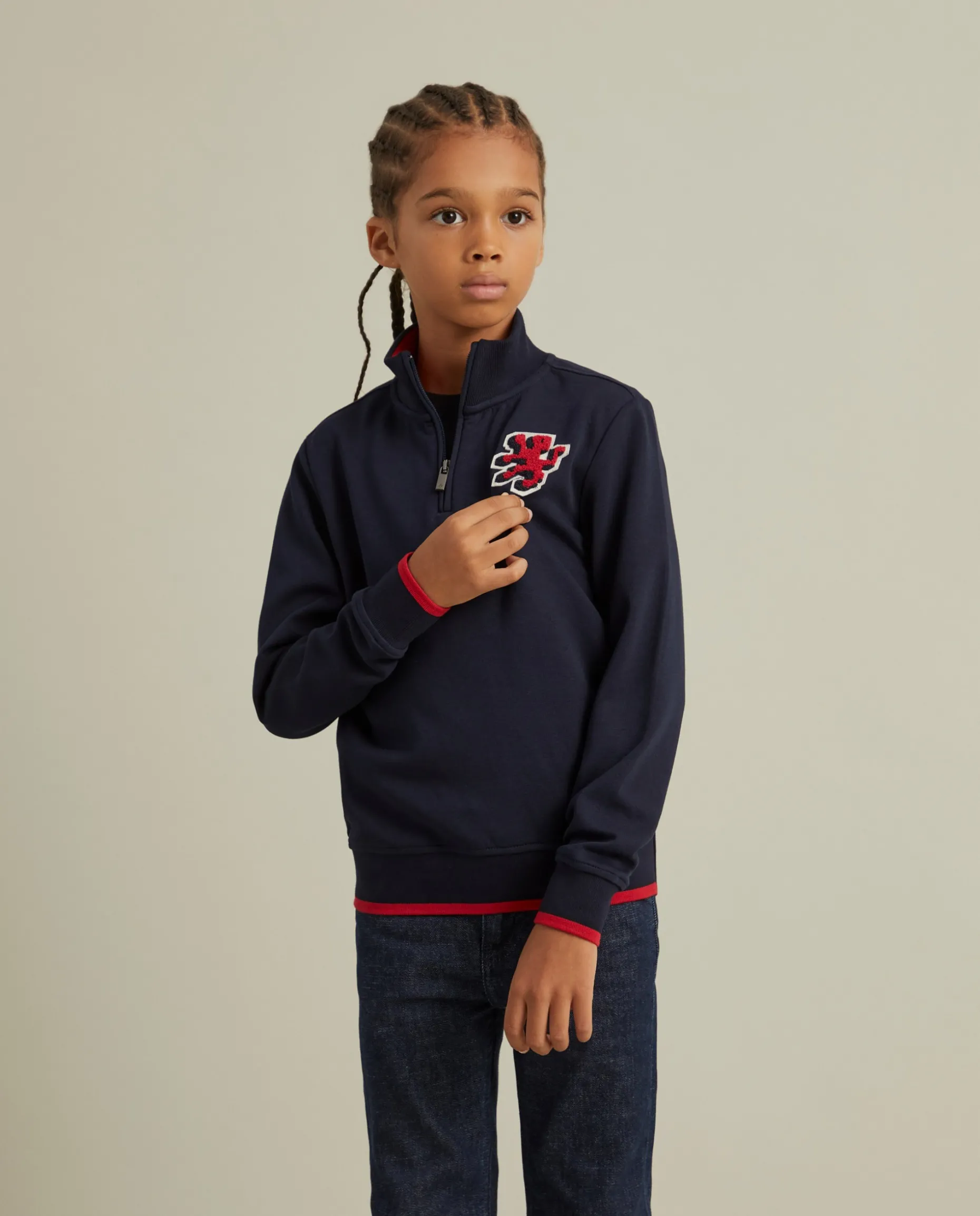 Sweater com fecho e riscas em contraste